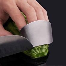 Adjustable stainless steel finger guard for safe slicing.