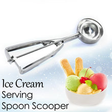 Ice cream scooper in hand