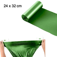 Biodegradable green garbage bags for sustainable waste management.