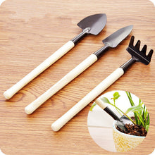 Set of 3 kid's garden tools including trowel, shovel, rake