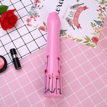 Mini folding umbrella with rose flower design.